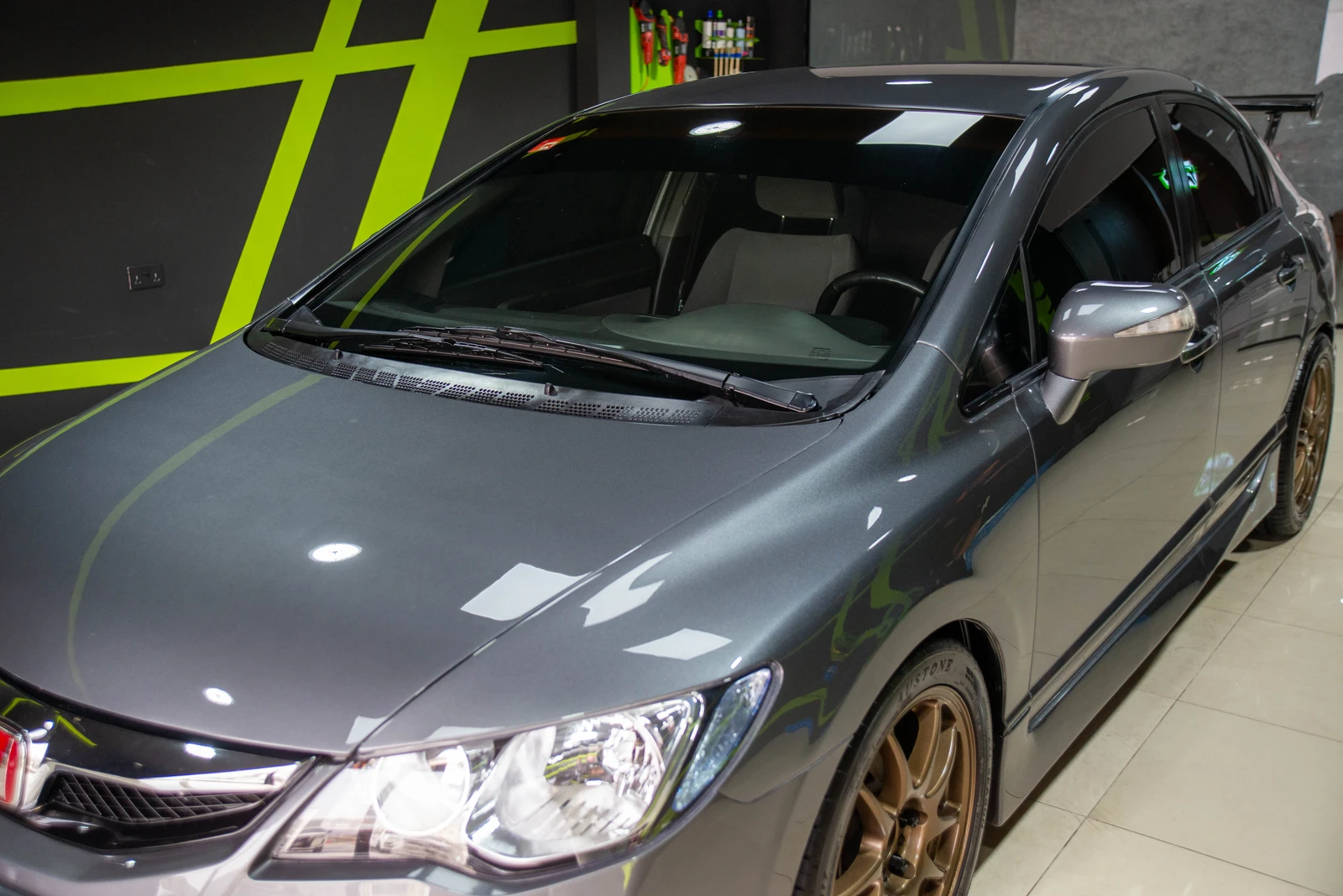 Honda Civic with glistening shine after detailing, buffing, and ceramic coating.