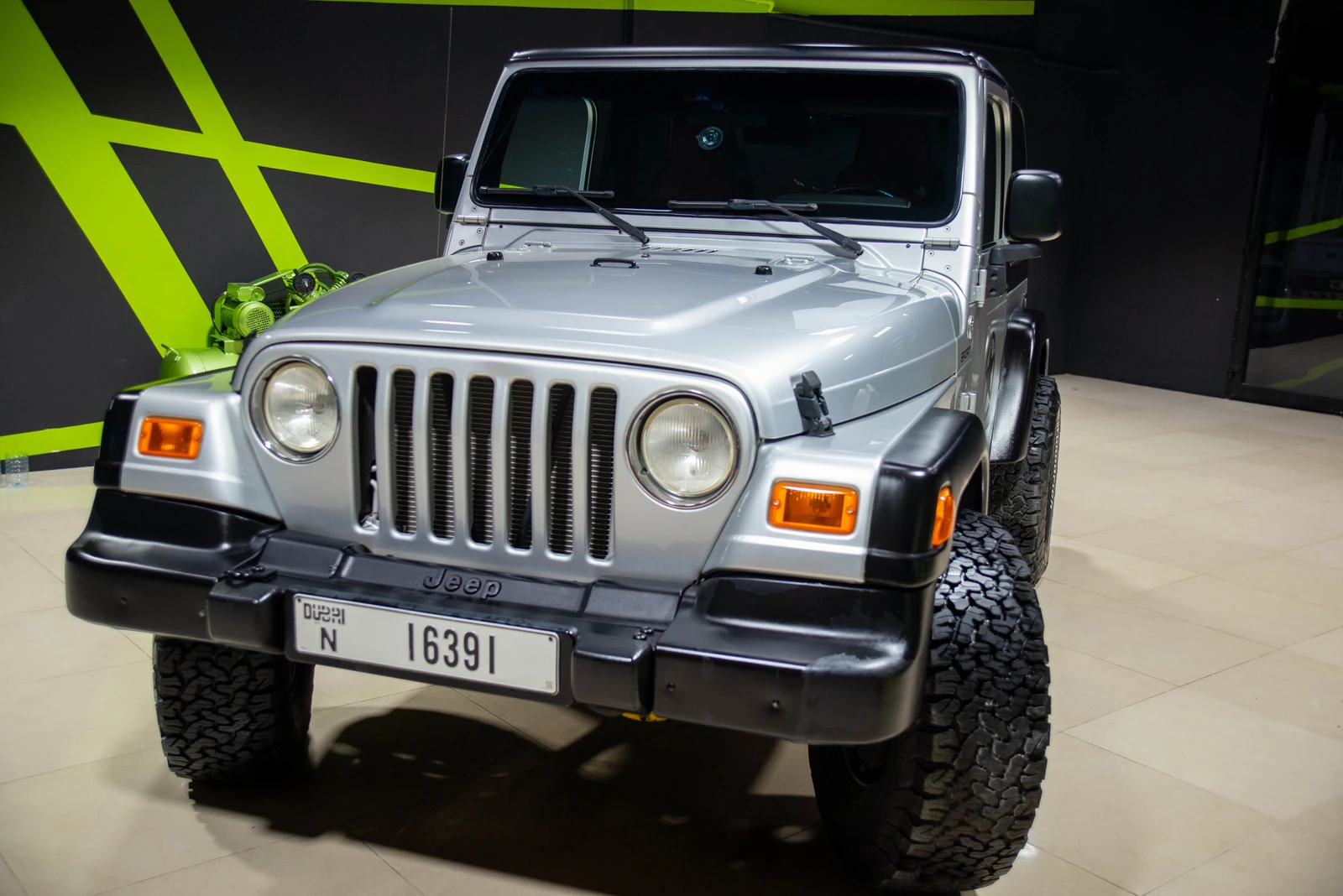 Shining Jeep Wrangler after ceramic coating, buffing, and full detailing.