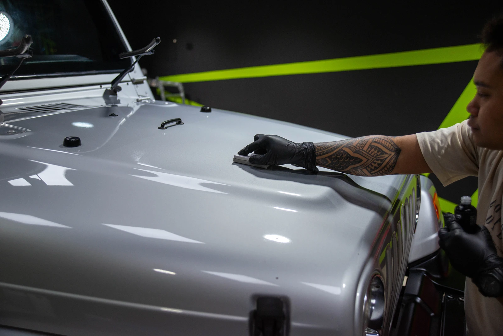 Jeep Wrangler undergoing ceramic coating process at Meraki Cars Decoration.